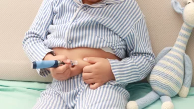 A kid injecting insulin source: burcu saritas/iStock